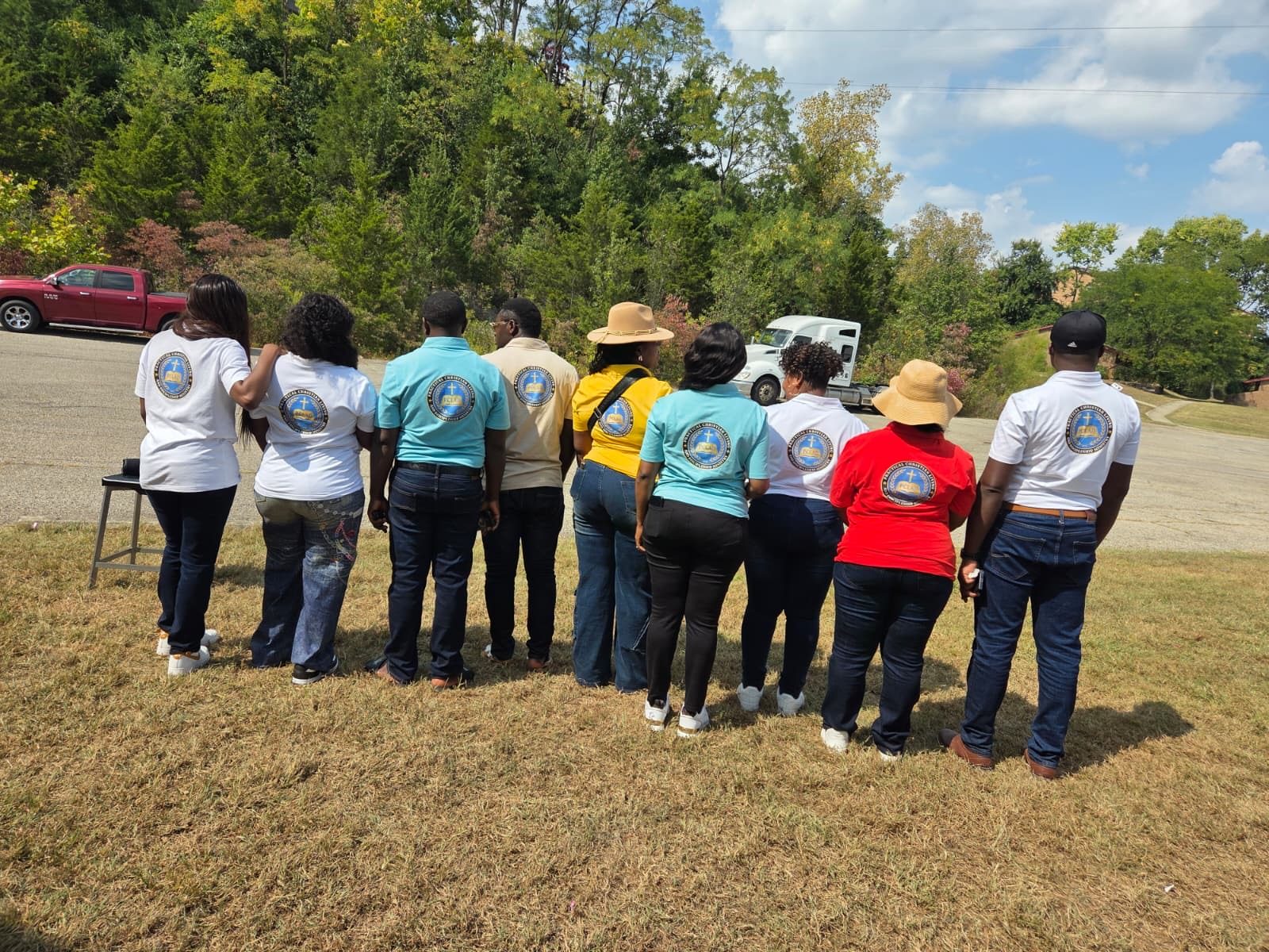 The outreach team walking out across a field